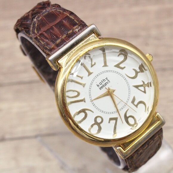 Vintage Kathy Ireland Watch Unisex Gold Tone Stainless Steel Big White Dial Y2k - Picture 1 of 8
